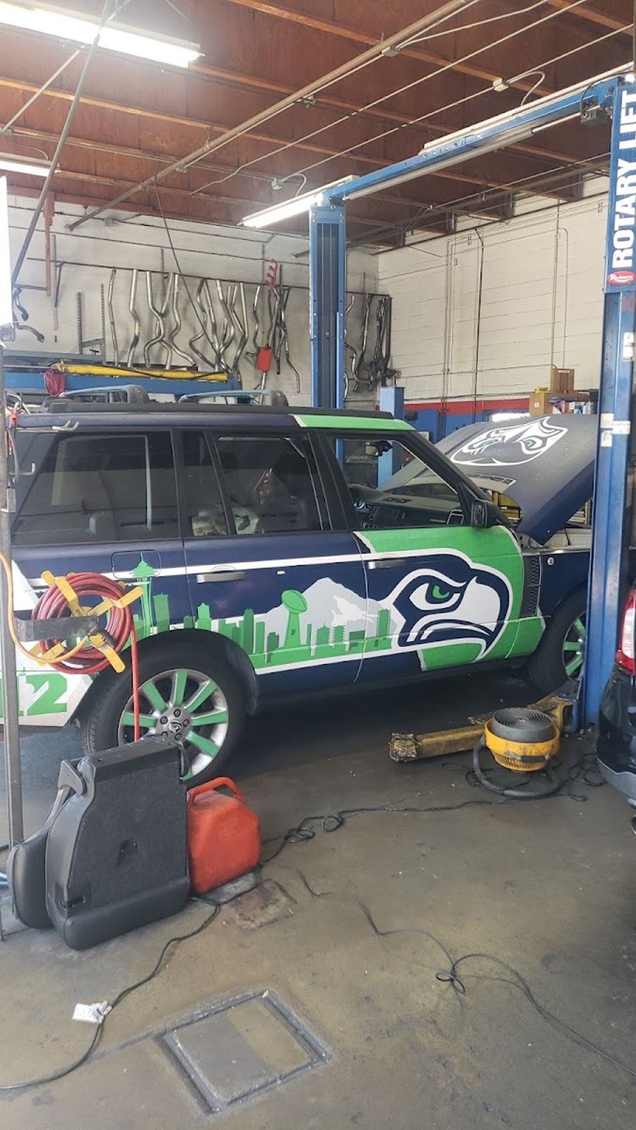 A customer&rsquo;s vehicle up in one of Petro&rsquo;s service bays